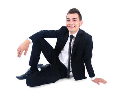 Isolated business man smiling at cameraの写真素材