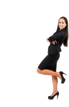 Isolated young business woman leaningの写真素材