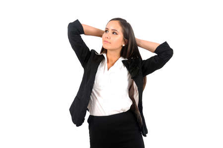 Isolated young business woman dreamingの写真素材