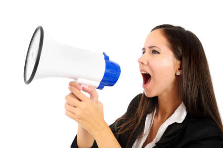 Isolated young business woman with loudspeakerの写真素材