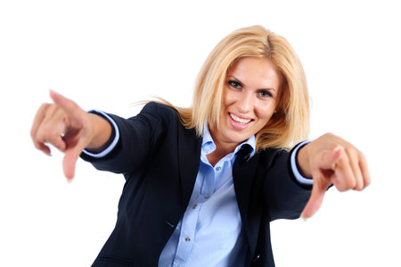 Isolated young business woman pointing camera