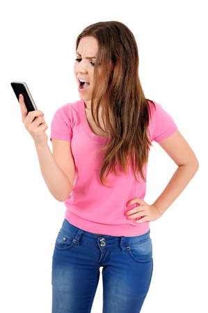 Isolated young casual woman screaming phoneの写真素材
