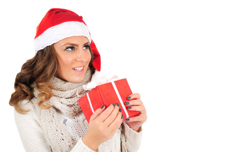 Isolated young christmas girl holding gift