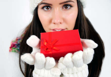 Young casual girl with giftの写真素材
