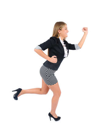 Isolated young business woman runningの写真素材
