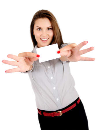 Isolated young business woman showing cardの写真素材