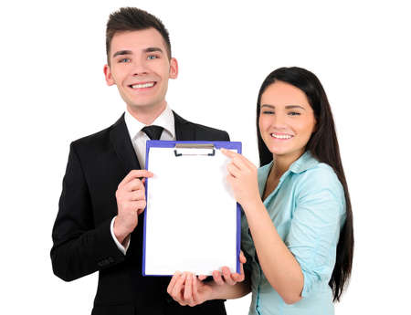 Isolated young business couple showingの写真素材