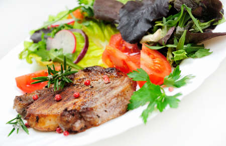 Salad and meat on whiteの写真素材