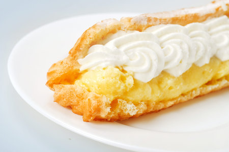 Eclair on grey background 