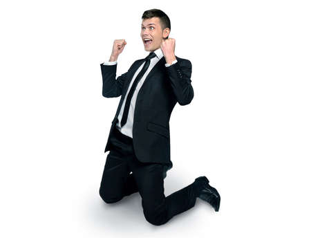 Business man winning with hands upの写真素材