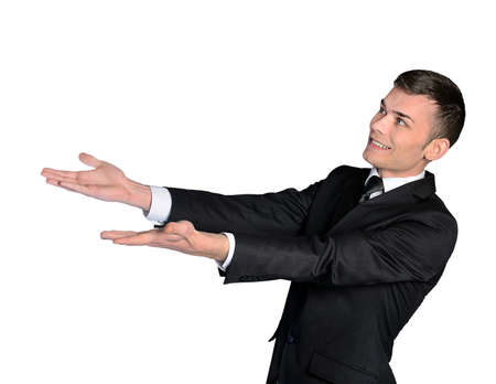 Isolated business man offering somethingの写真素材