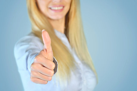 Business woman showing ok signの写真素材