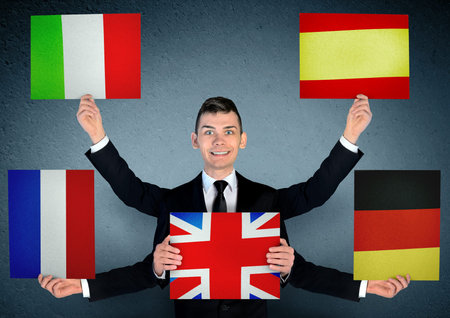 Business man with languages boardの写真素材