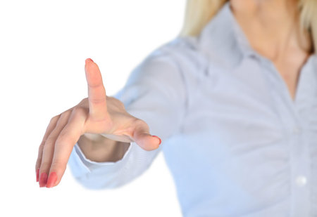 Isolated business woman pushing somethingの写真素材