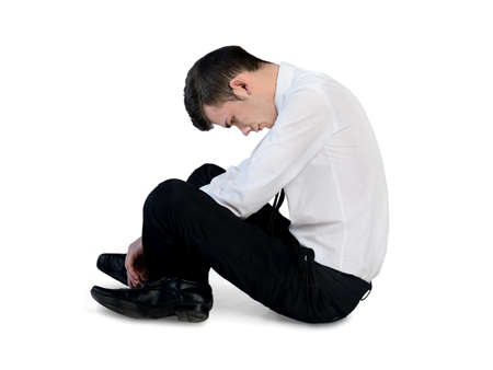 Isolated business man standing downの写真素材