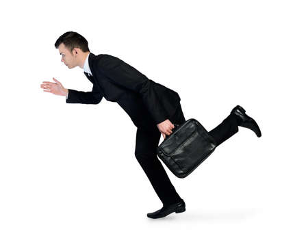 Isolated business man running sideの写真素材