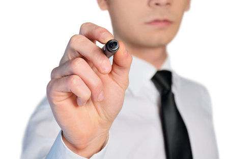 Isolated business man write something