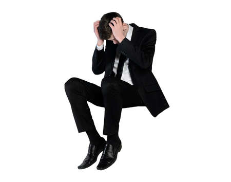 Isolated business man sad looking downの写真素材