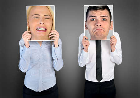 Sad business woman and man on bannerの写真素材