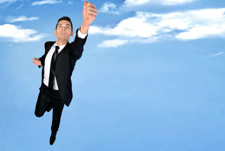 Super hero concept of business man flyの写真素材