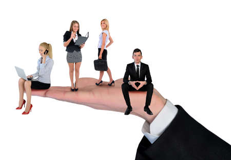 Isolated hand holding business teamの写真素材