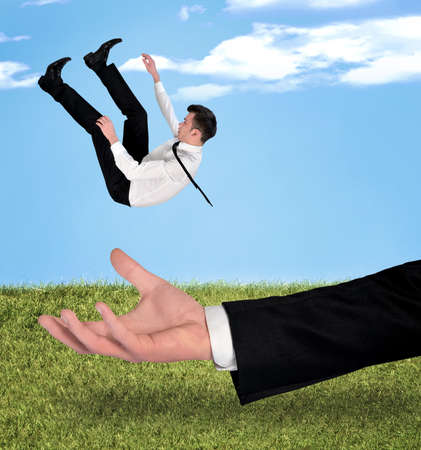 Young business man fall outdoorの写真素材