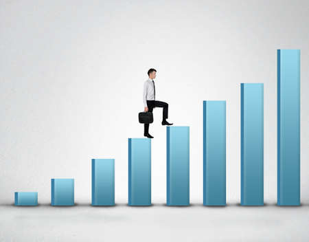 Business man climb blue bar stairsの写真素材