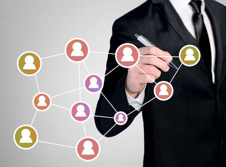 Business man close-up write people networkの写真素材