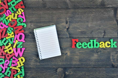 Feedback word on wooden tableの写真素材