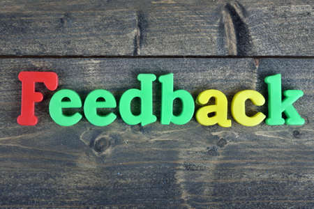 Feedback word on wooden tableの写真素材