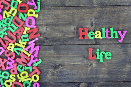 Healty life word on wooden tableの写真素材