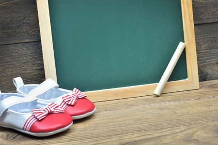 School board on wooden tableの写真素材