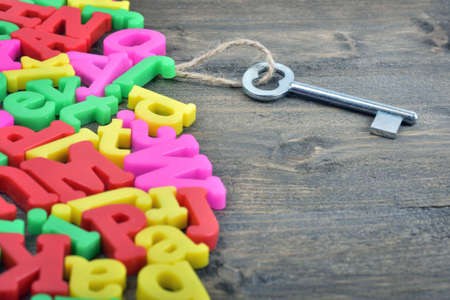 Old key word on wooden tableの写真素材