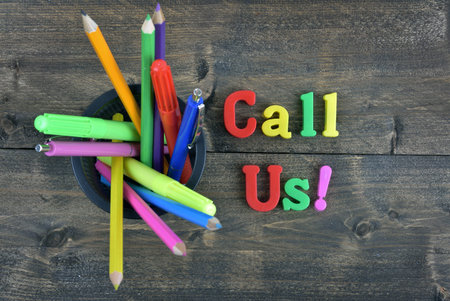 Call Us word on wooden tableの写真素材