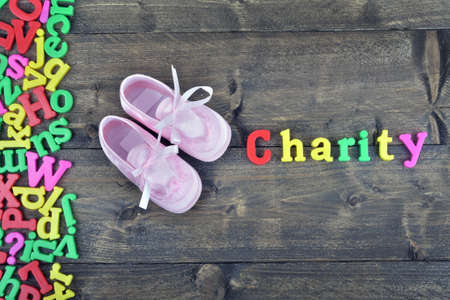 Charity word on wooden tableの写真素材