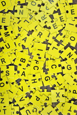 Puzzle pieces on wooden tableの写真素材