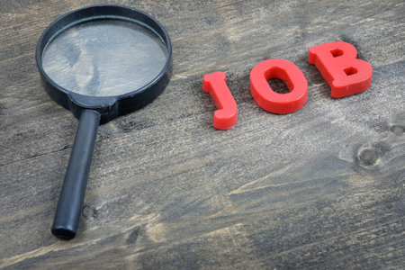 Job word on wooden tableの写真素材