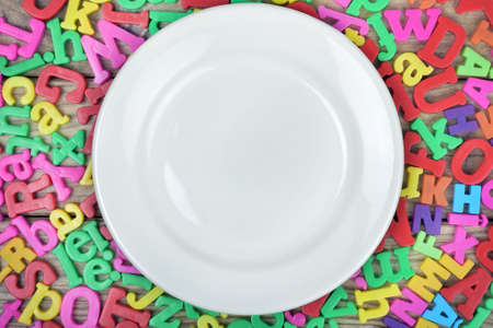 Many letters and white plateの写真素材