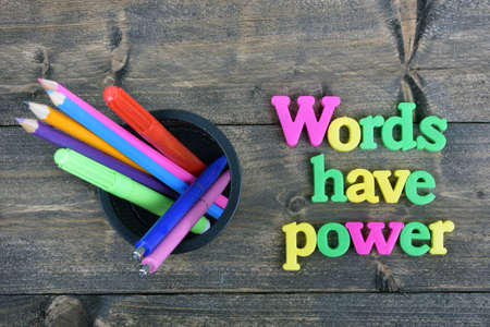 Words have power word on wooden table