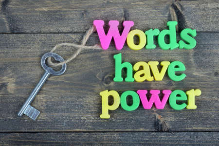 Words have power word on wooden tableの写真素材