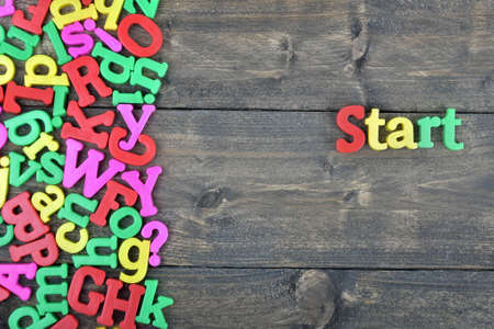 Start word on wooden tableの写真素材