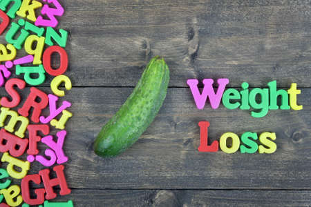 Weight loss word on wooden tableの写真素材