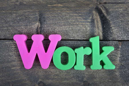 Work  word on wooden table