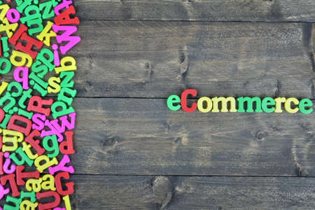Ecommerce word on wooden tableの写真素材