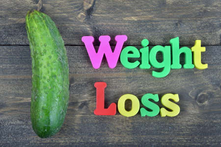 Weight loss word on wooden tableの写真素材