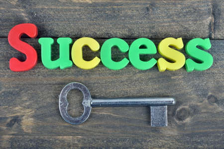 Success word on wooden tableの写真素材