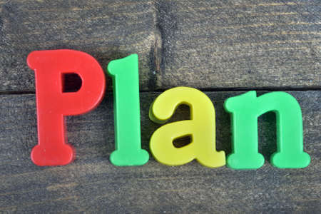 Plan word on wooden table
