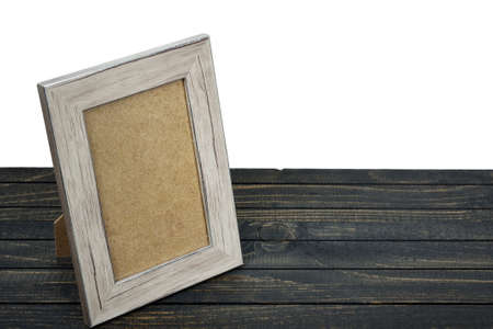 Photo frame on wooden tableの写真素材