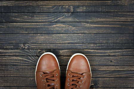 Sport shoes on wooden floorの写真素材