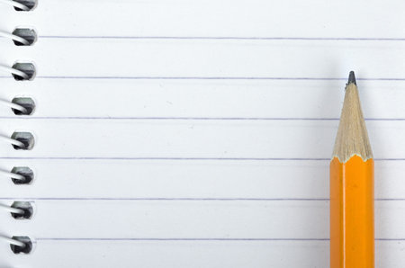Empty notepad and pencil close-upの写真素材